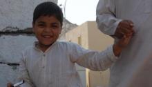 Afghan boy smiling